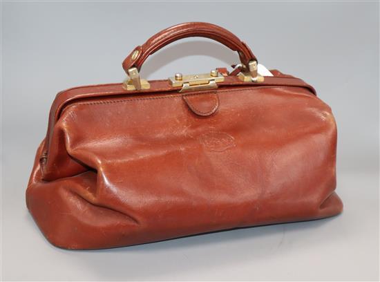 A brown leather Gladstone bag width 39cm